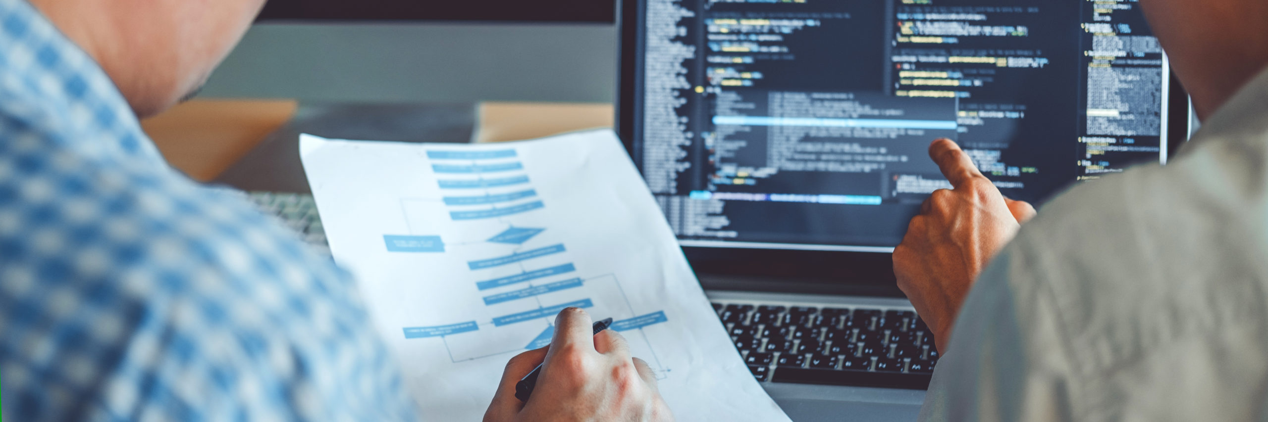 Programmers working on a website
